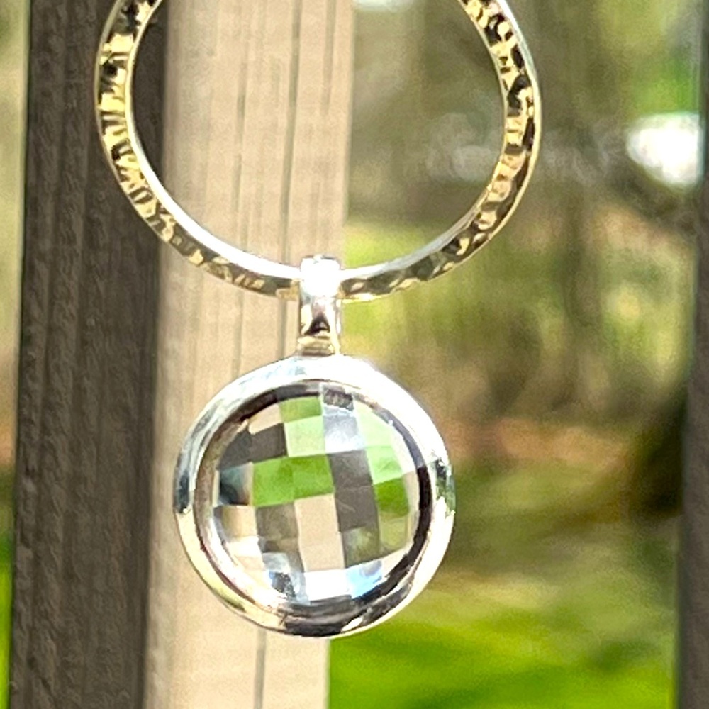 Quartz crystal pendant.